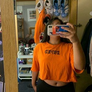 Cropped orange “Dazed” old English font